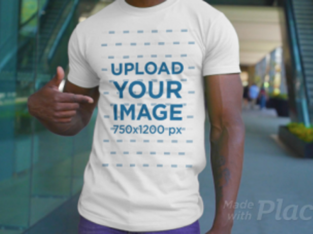 Video of a Happy Man Pointing at His Customizable T-Shirt 3391v