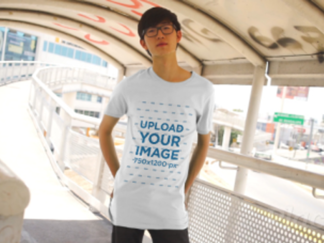 Crew-Neck T-Shirt Video of a Young Man Posing in an Urban Scenario 3419v