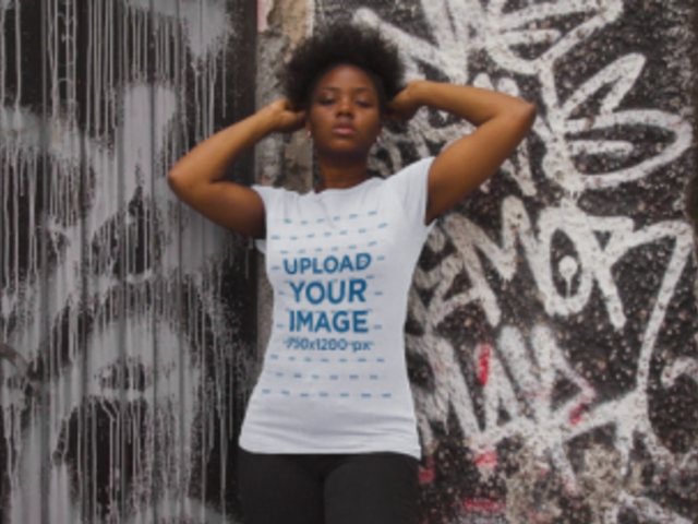 T-Shirt Video of a Woman Posing Against a Graffiti Wall 3406v