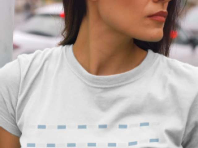 T-Shirt Video Featuring a Serious Woman Posing on the Street 3617v