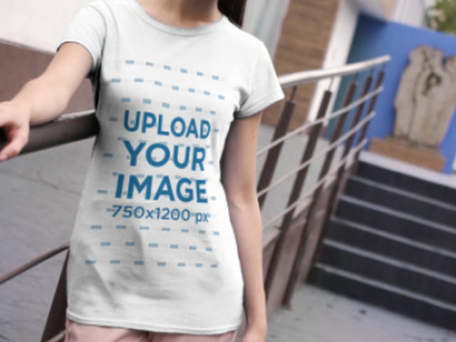 T-Shirt Video of a Young Woman Posing Outside a Building on a Cloudy Day 3667v