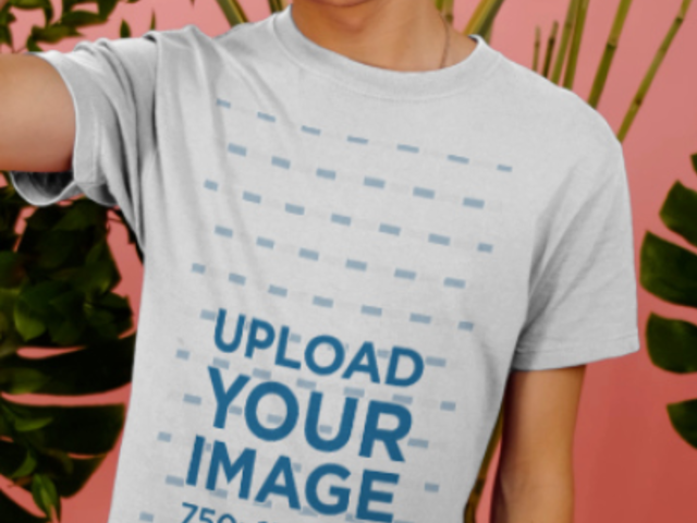 T-Shirt Video Featuring a Young Man Posing by Tropical Plants 3901v