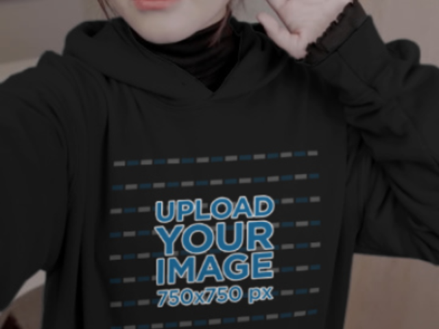 Hoodie Video of a Young Woman Taking a Selfie 4479v