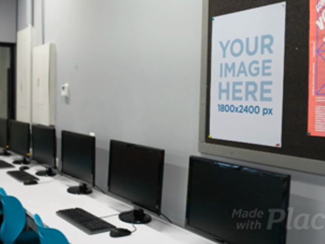 Poster Video Mockup Hanging On A Wall While A Girl Is Working On Her Lab Computer a13886