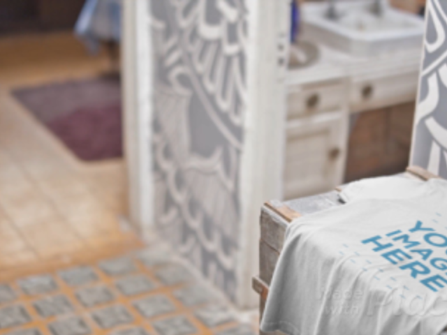 T-Shirt Video Mockup Lying on a Wooden Trunk a13141