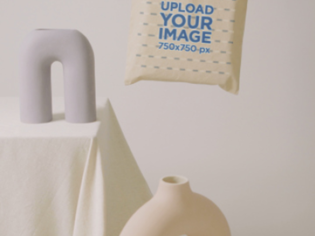 Video of a Man Holding a Tote Bag Featuring a Pottery Theme 5031v