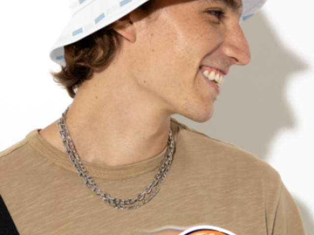 Video of a Bucket Hat Featuring a Happy Man Surrounded by an Animated Alien Sticker 5138v