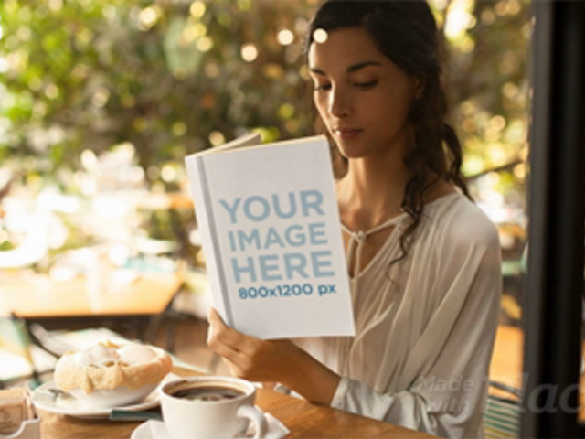 Pretty Student Reading a Book in Stop Motion at a Cafe a13661
