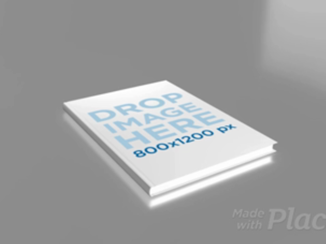 Video of a Hardcover Book Lying on a Flat Gray Surface a16043b