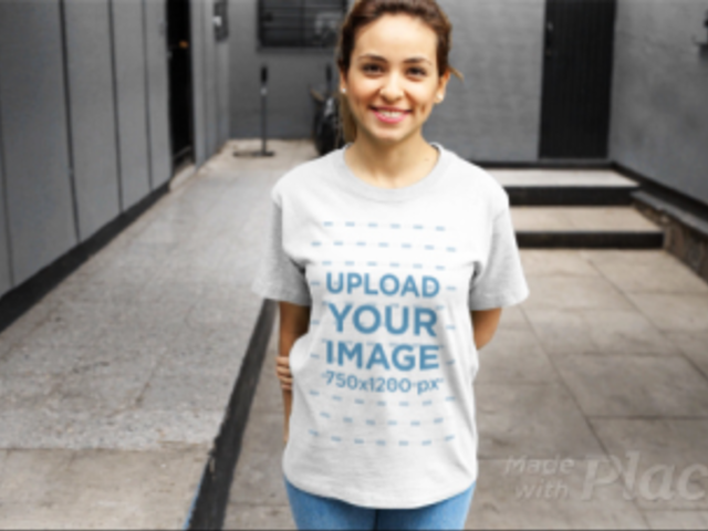 Young Woman Wearing a Round Neck Tee Video Holding her Arm a13049