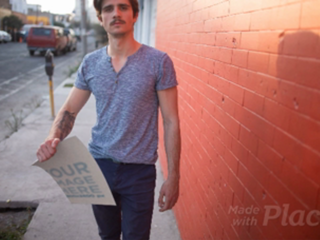 Stop Motion Featuring a Hipster Man Holding a Poster Held In The Street 13653