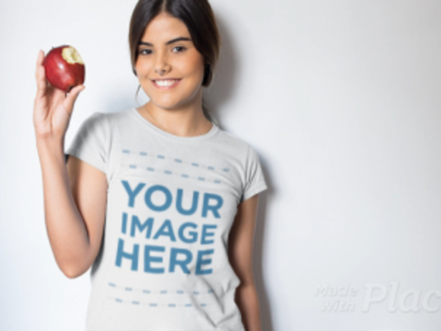 Video of a Beautiful Girl Eating an Apple Wearing a T-Shirt a13230