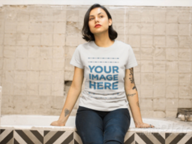 Girl Sitting In a Tub Wearing a T-Shirt Video a12823