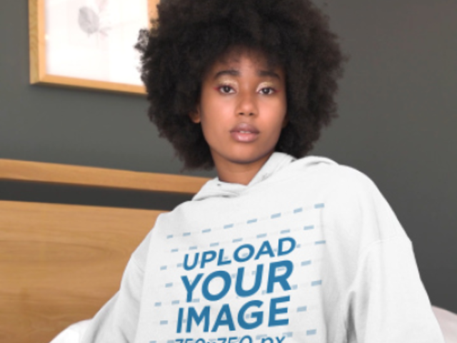 Hoodie Video Featuring an Afro Hairstyle Woman Posing on a Bed 5774v