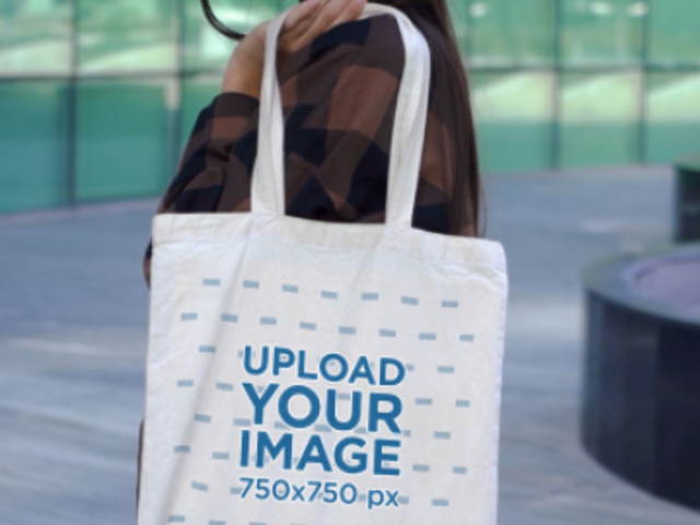Video of a Posing by the Street While Holding a Tote Bag 5817v