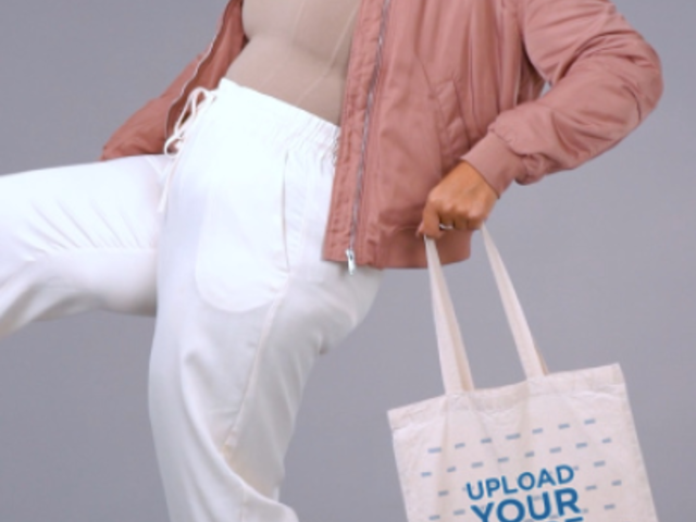 Video of a Cool Woman With Sunglasses Holding a Tote Bag 5843v