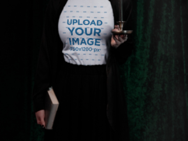 T-Shirt Video of a Woman in a Wicca Outfit Holding a Candle 6129v