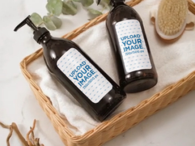 Video of a Glass Pump Bottle and a Spray Bottle Placed on a Nice Basket 6754v