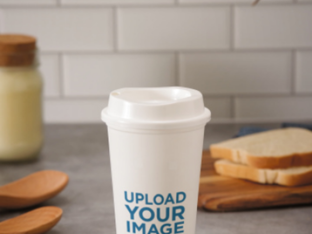 Video of a Reusable Cup Placed on a Table Featuring Bread Slices 6755v