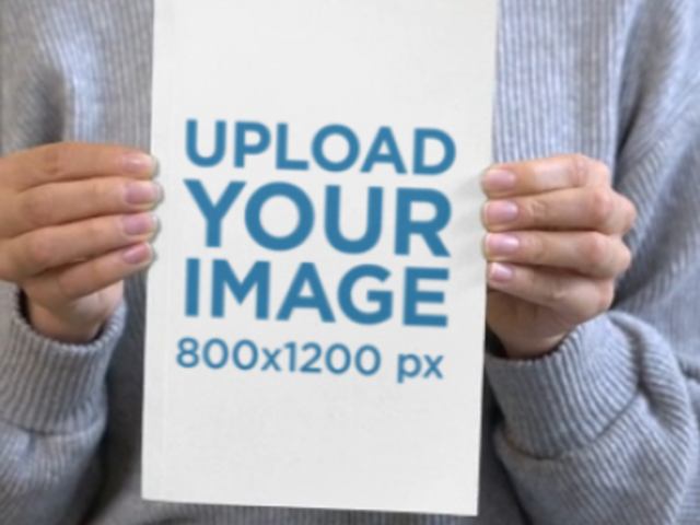 Video of a Cropped-Face Woman Holding a Book 7613v