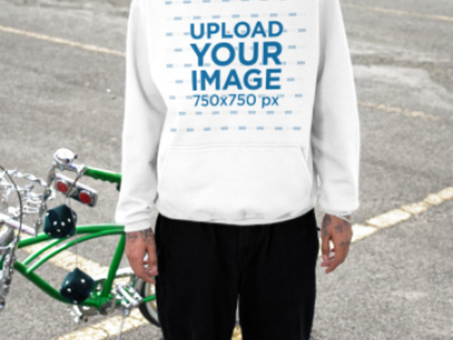 Gildan Pullover Hoodie Video Featuring a Tattooed Man Posing in a Parking Lot 7618v