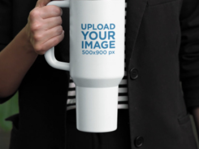 Video of a Woman Holding a Stanley Tumbler 7614v