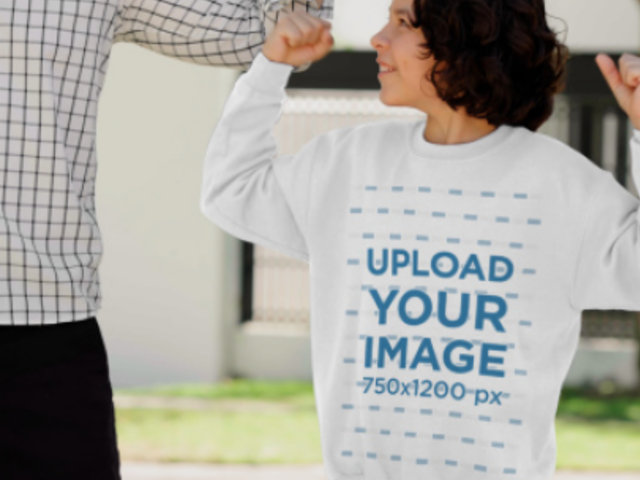 Video of a Cheerful Boy Wearing a Gildan Sweatshirt and Posing With His Dad for Father's Day 8754v