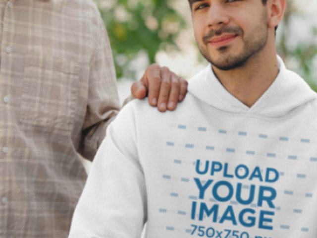 Gildan Hoodie Video Featuring a Cheerful Bearded Man Posing With His Father 8749v