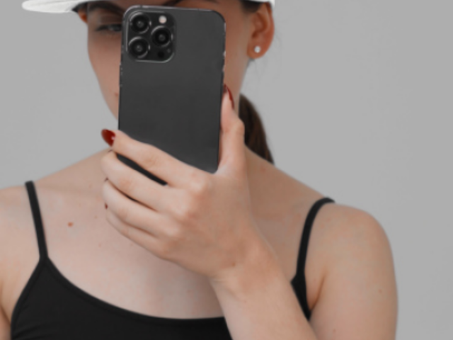 Snapback Hat Video Featuring a Woman Taking a Selfie in a Studio 8879v