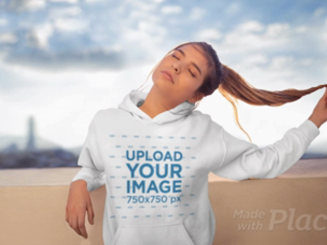Parallax Video Featuring a Girl Wearing a Hoodie on a Rooftop 25449