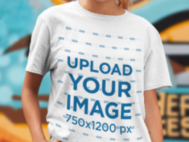 Parallax Video of a Woman with a T-Shirt Standing by a Graffiti Wall 25598