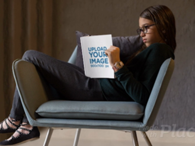 Parallax Video Mockup Featuring a Girl Reading a Book in a Cool Chair 25879