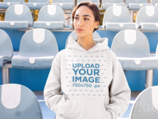 Hoodie Video of a Woman Sitting at a Stadium 13208