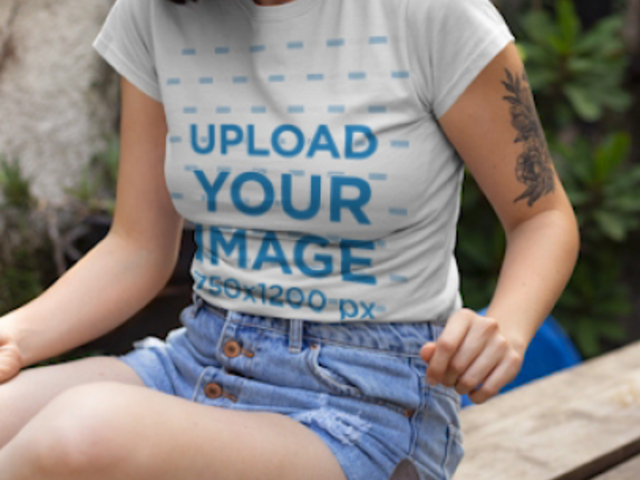 T-Shirt Video of a Woman with an Arm Tattoo Sitting Next to a Cat 22433