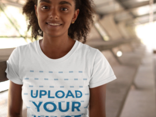 Crewneck T-Shirt Video Featuring a Curly-Haired Woman Smiling 22841