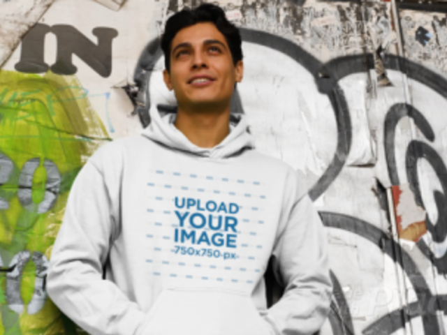 Video of a Man Wearing a Pullover Hoodie with a Graffiti Background 32022