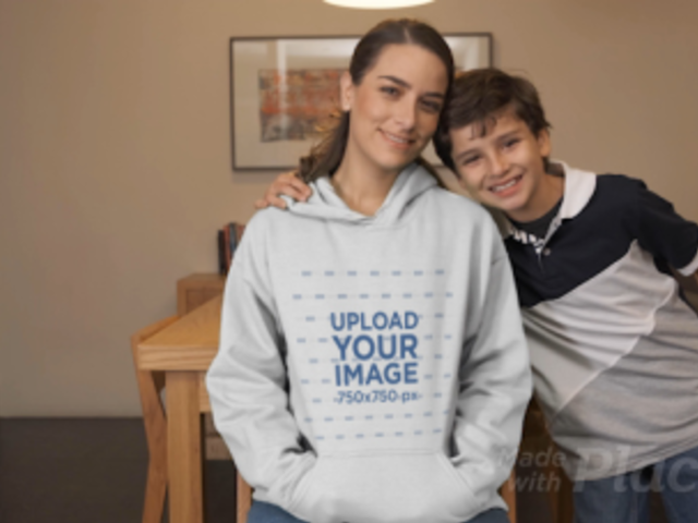 Hoodie Video of a Mom and Her Son Posing in the Living Room 32338