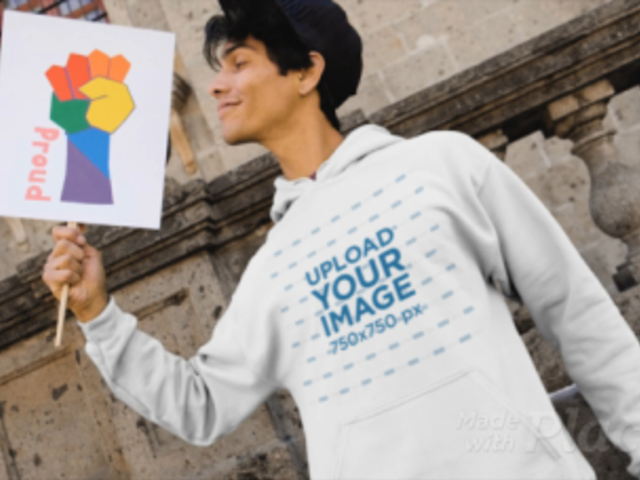 Apparel Video of a Man with a Hoodie Holding a Pride Sign 33355
