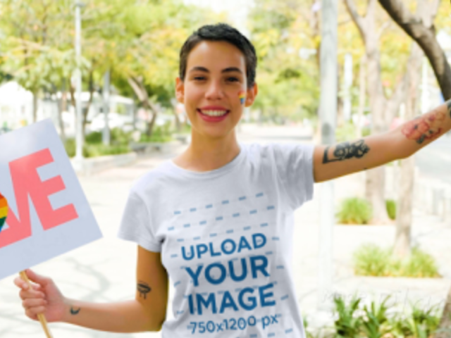 T-Shirt Video of a Woman Holding a Sign at the Pride Parade 33368