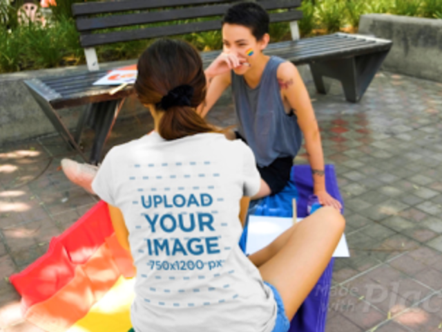 Back View T-Shirt Video Featuring a Woman Sitting on an LGBTQ Flag 33365