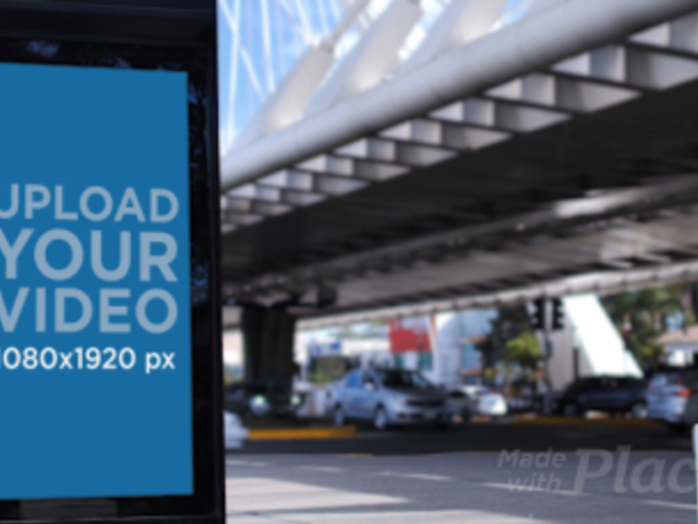 Video of a Mupi on a Busy Street 32964