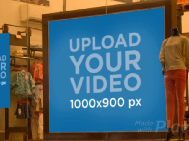 Video of a Poster and a Billboard in a Clothing Store Window Display 34378