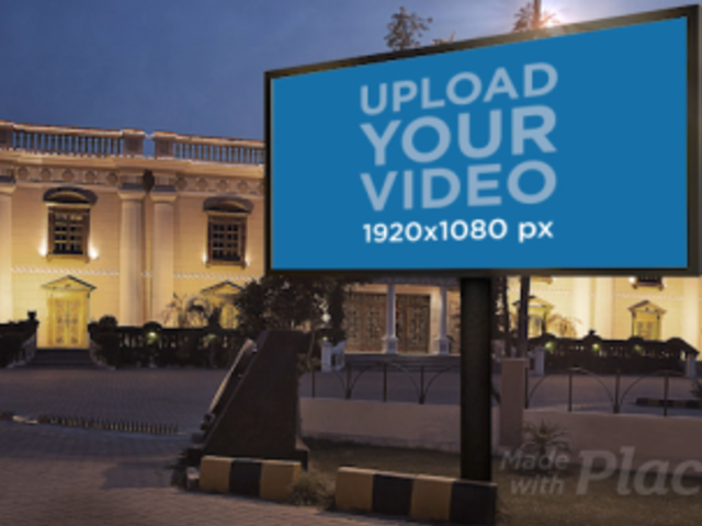 Video of a Billboard Placed Outside of a Fancy Building 34382