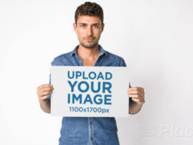 Video of a Curly-Haired Man Holding a Poster in Front of Him 13797
