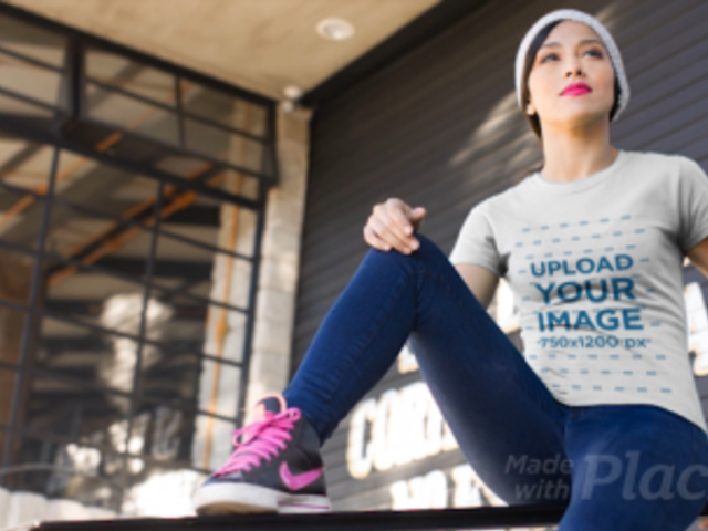 T-Shirt Video of a Woman with Urban Look Sitting Outside a Restaurant 12827