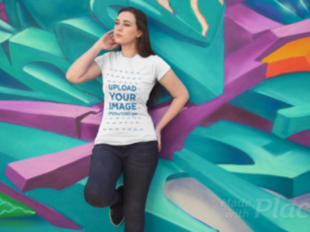 T-Shirt Video of a Woman Posing by an Artsy Wall 3024v