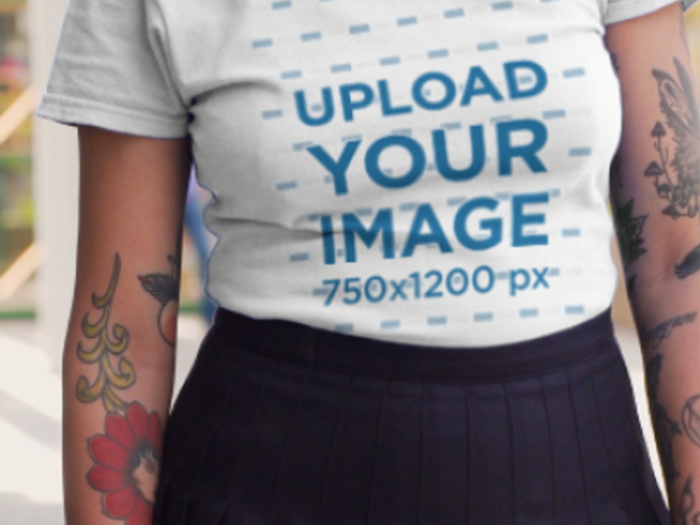 T-Shirt Video Featuring a Tattooed Woman Strolling Around the City 3121v