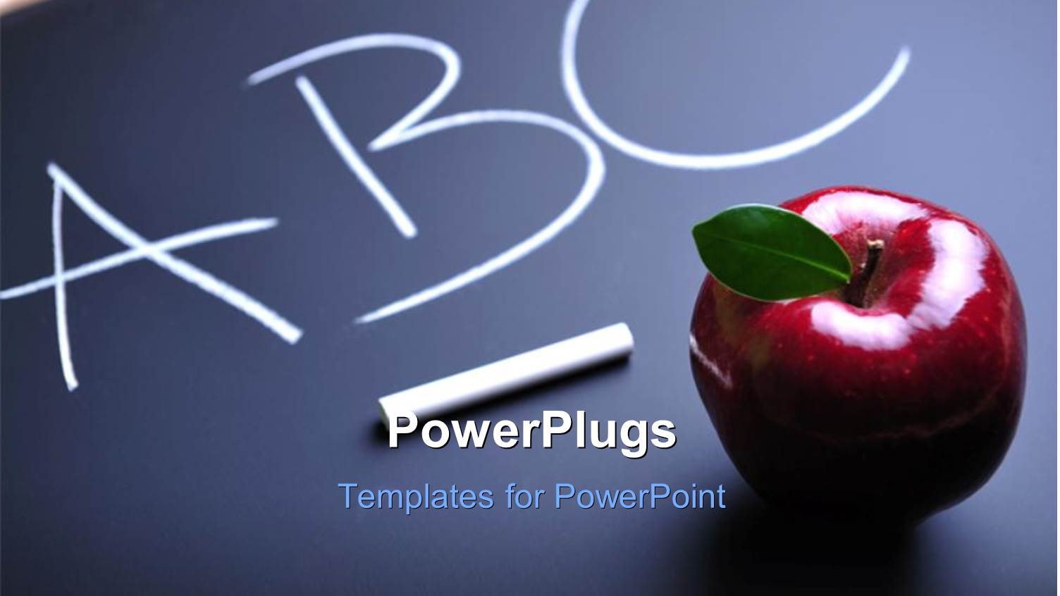 ABC Written on Blackboard with Chalk and Red Apple Sitting on Board