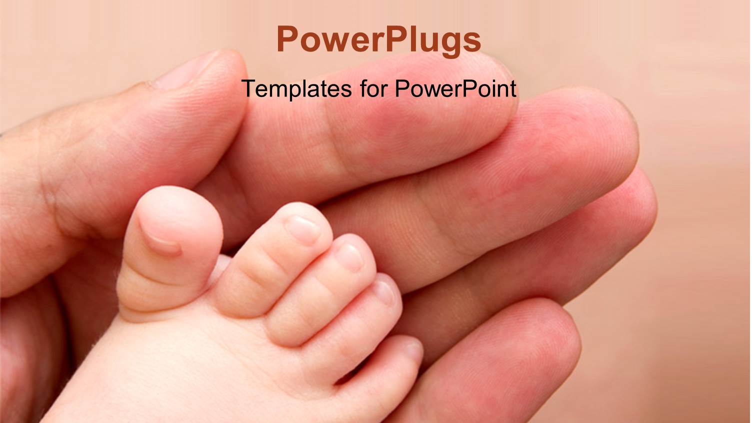 an Adult Hand and Touching a Baby's Feet