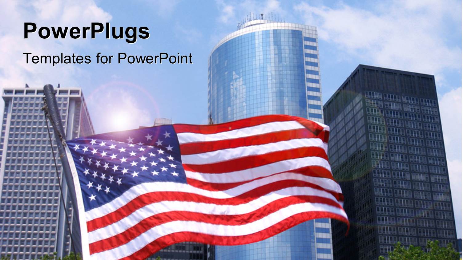 American Flag with Office Buildings Over Blue Cloudy Sky